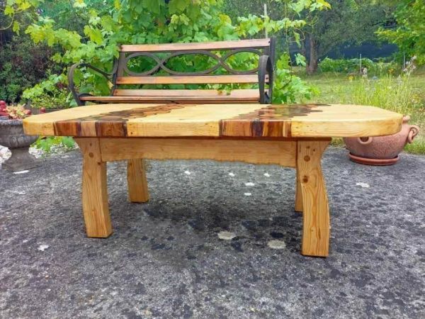 Pine table with cross cut end on log inlay with resin image one